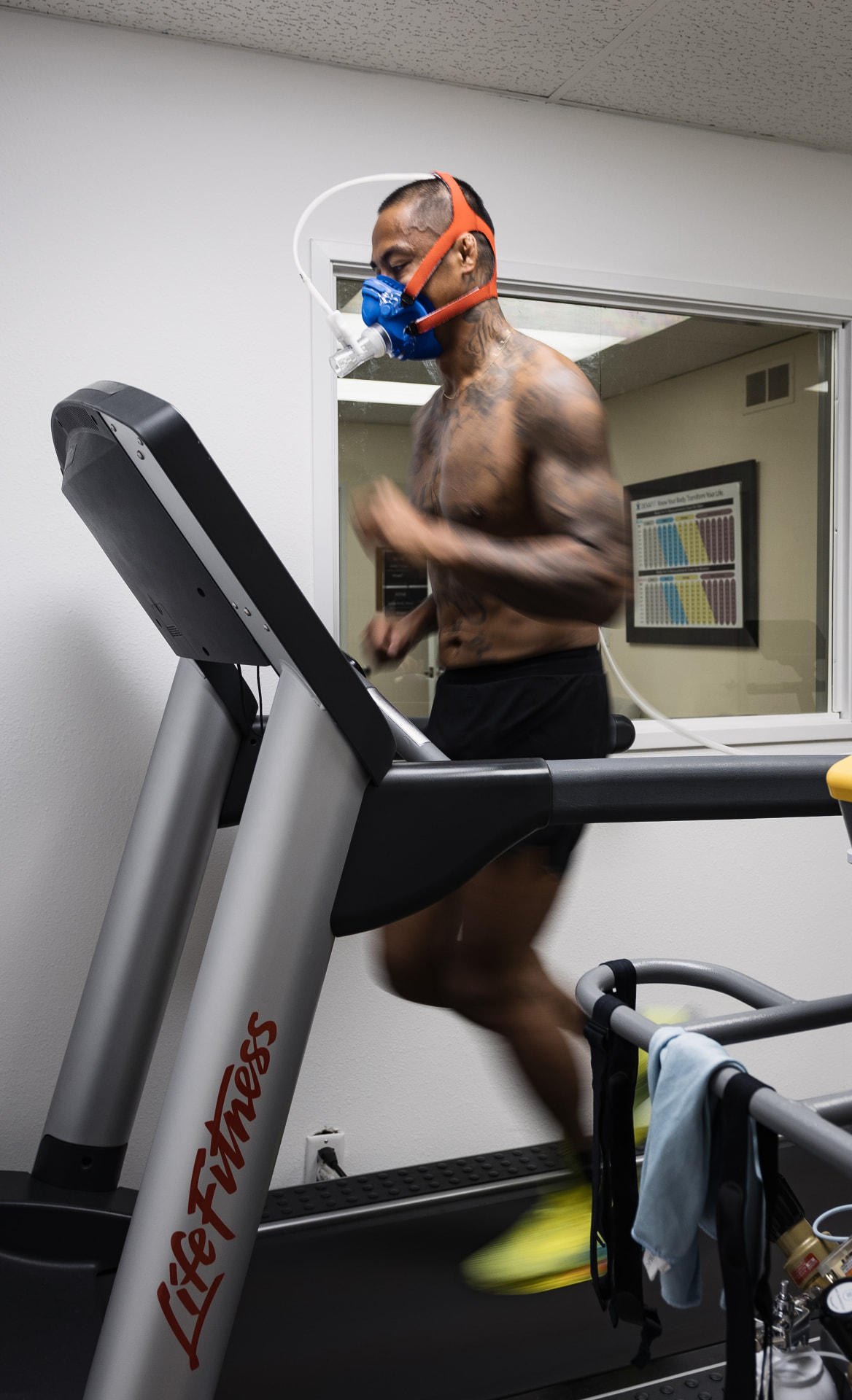 Athlete running on a treadmill during a VO2 max test